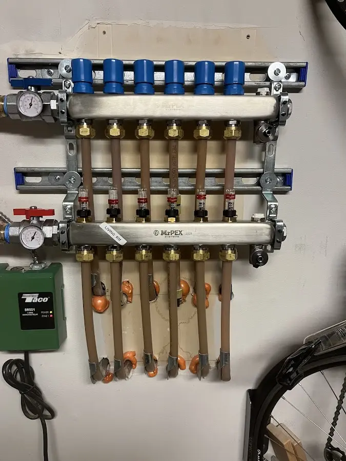 Plumber performing Gas Line Installation at a residential property in Brimfield